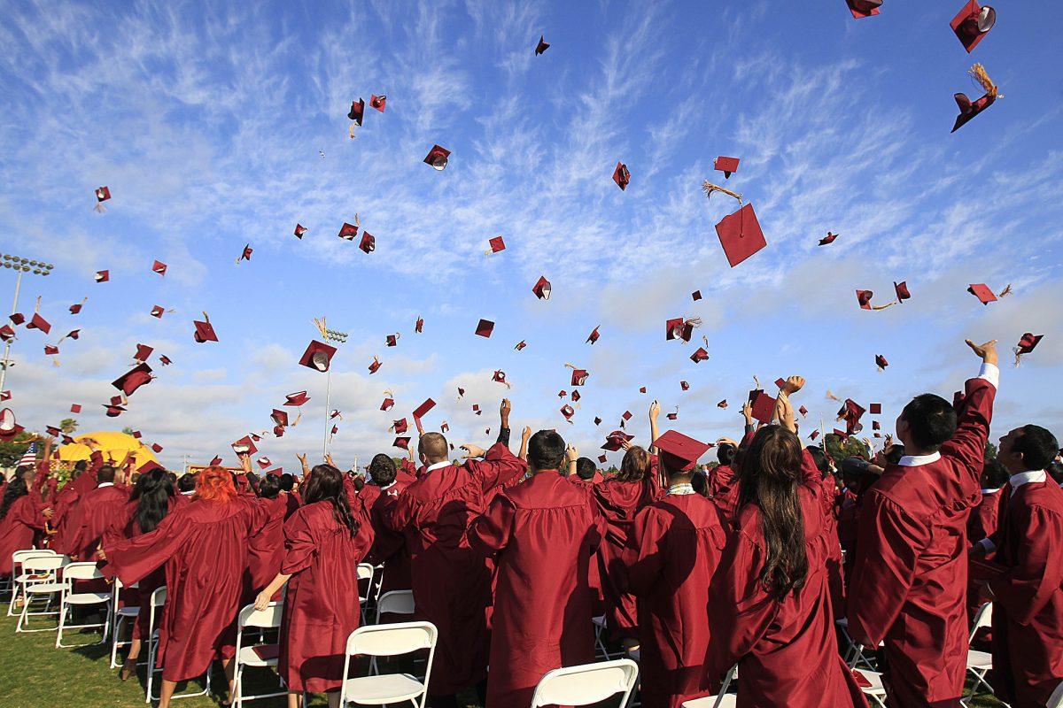 HUNTINGTON BEACH, CA, June 11, 2013 -- Graduates toss their caps in the air during the conclusion of Ocean View High School's 2013 commencement on Wednesday.  (Kevin Chang/ HB Independent)