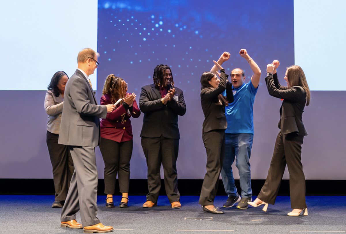 Elia Haghbin and Lauren Von Hassel winning the Lockheed Martin Award in Washington, D.C.